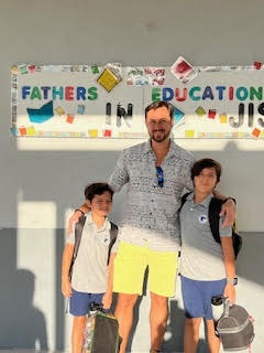 father and students